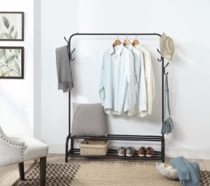 clothes rail in bright modern bedroom