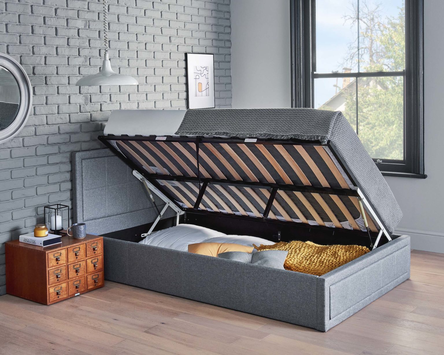 bed with mattress that lifts up
