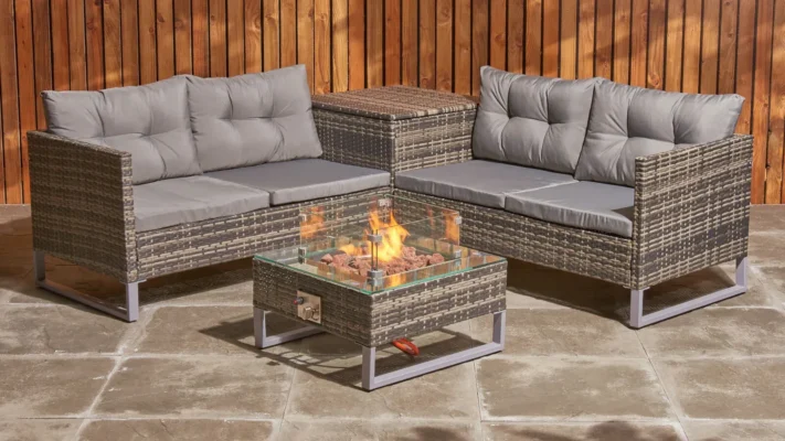 An image showing a garden furniture set which comes with a fire pit.